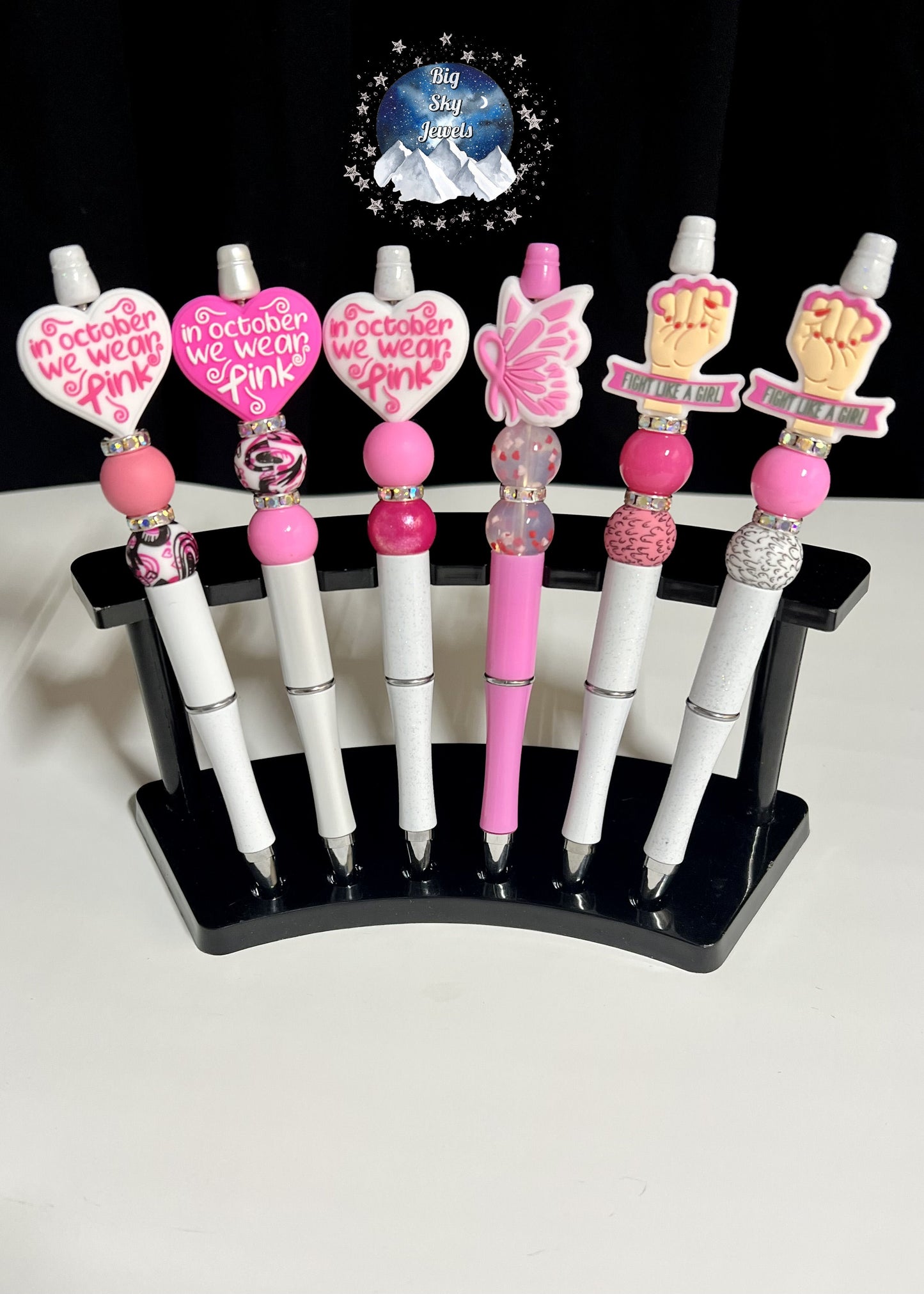 Breast Cancer Awareness Silicone Pen Choices are: In October We Wear Pink, Fight like a girl, or Pink Butterfly Ages 5+ Ladies Multiple Variation Listing
