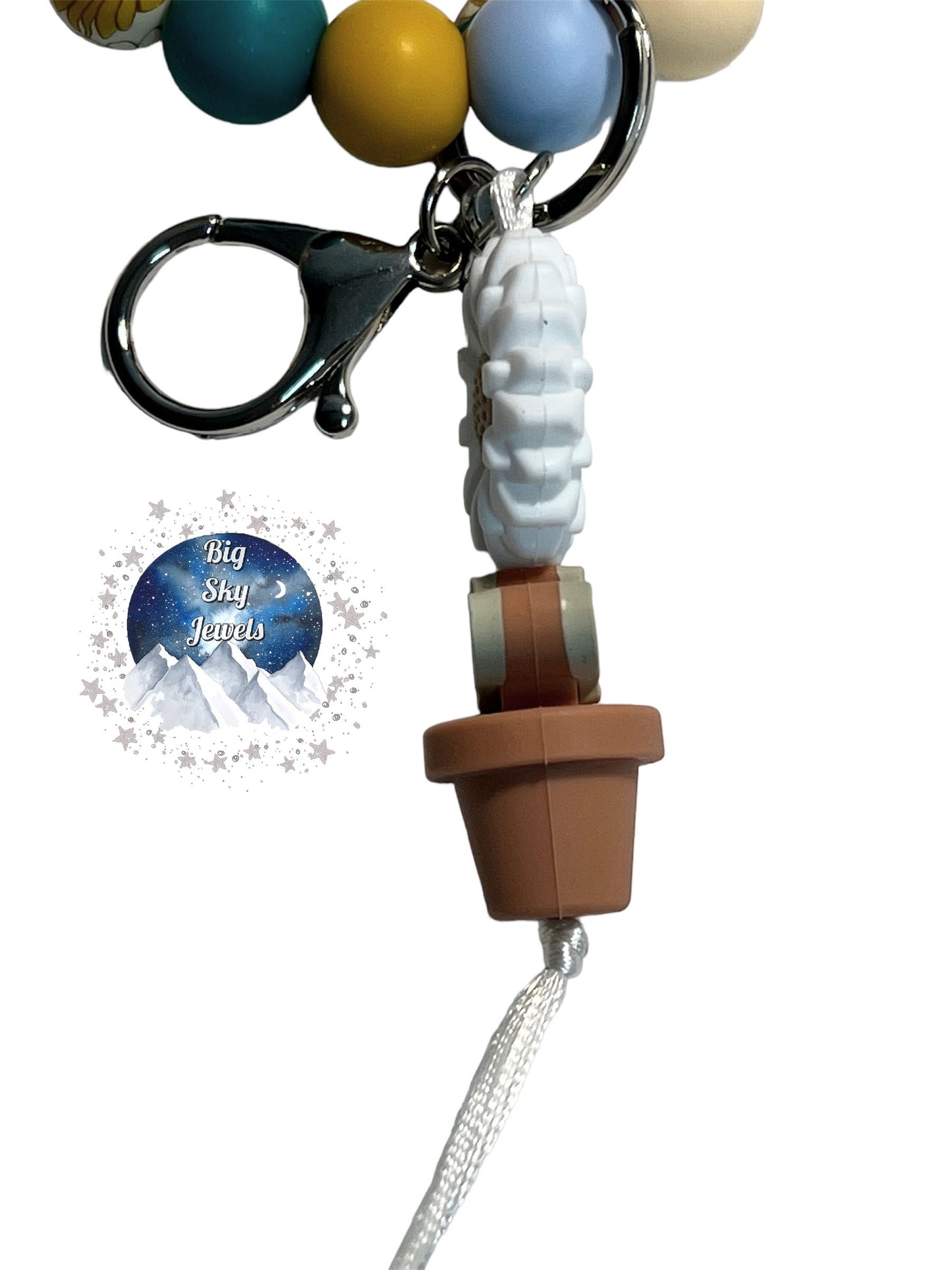 White Boho Flower Silicone Wristlet Keychain Floral Print, Teal, Beige, Cornflower Blue, and Sunflower Yellow. Ages 8+ Kids or Ladies Moms Mothers Day