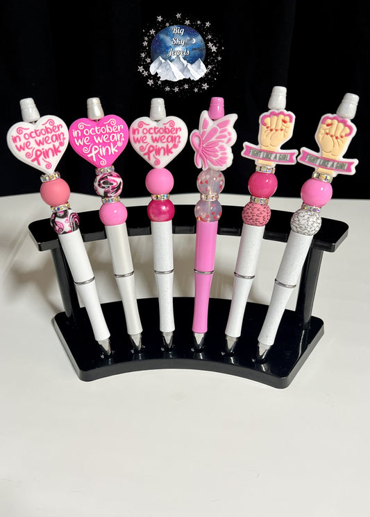 Breast Cancer Awareness Silicone Pen Choices are: In October We Wear Pink, Fight like a girl, or Pink Butterfly Ages 5+ Ladies Multiple Variation Listing