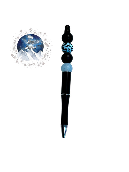 Light Blue Glitter Cow Print Pen Silicone Light Blue Cow print, Light Blue Glitter, and Black Ages 5+ Kids or Ladies Men Western West