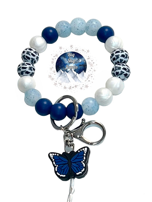 Blue Butterfly Wristlet Keychain Silicone, Butterfly Print, White Pearl, Blue, and Glitter Blue. Ages 8+ Kids or Ladies Moms