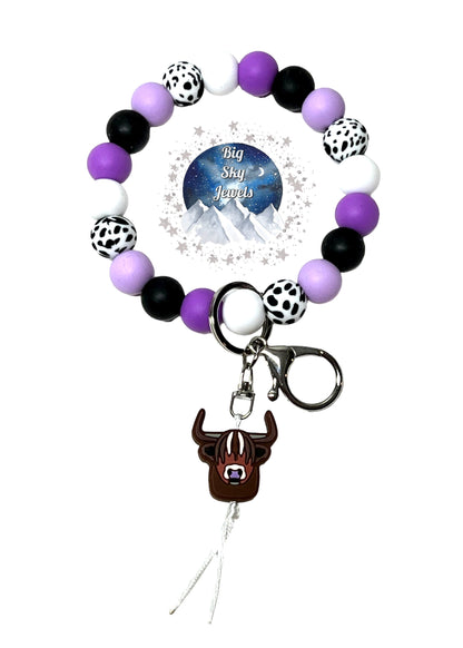 Lavender Nose Long Horn Cow White W/ Black Cow Print Silicone Wristlet Keychain Cow Print Beads, Black, Lavender Mist, Lavender Purple and White. Ages 8+ Kids or Ladies Moms Summer Fall Western West Multiple Variation Listing